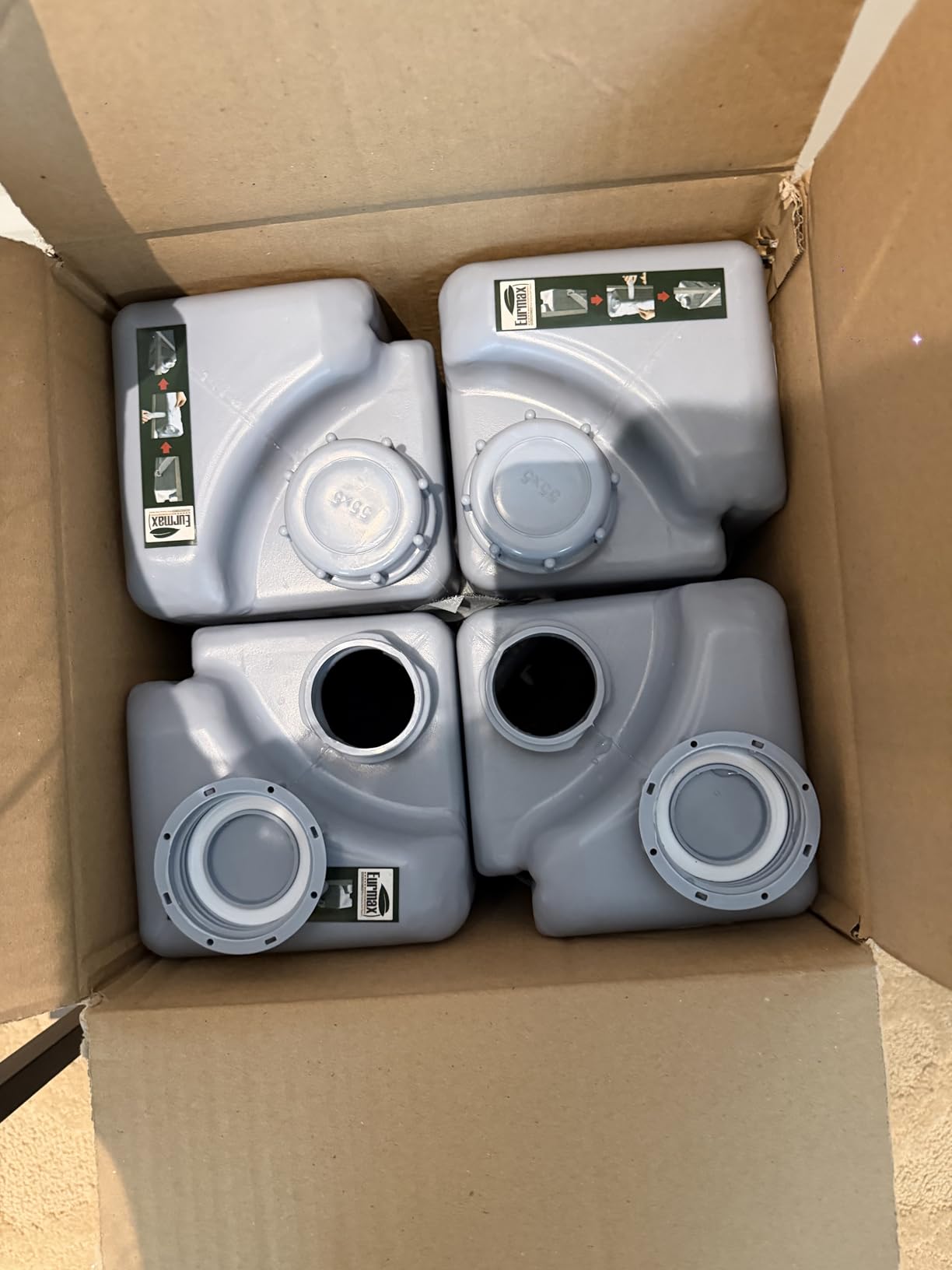 Eurmax USA 4-Pack Universal Upgraded Commercial Canopy Weights - Leg Weight Bottles for Pop Up Canopy Tents, Gazebos and Shelters - Easy Wrap-Around Hook and Loop Installation, Multi-Fill: Water, Sand, Gravel and More customer photo 1
