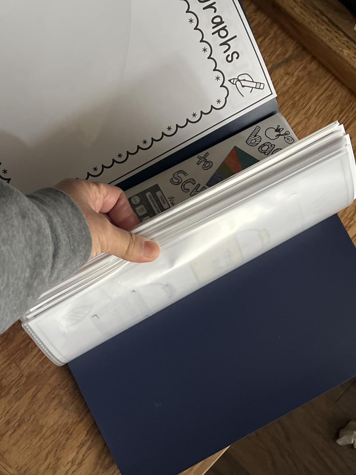 Dunwell Presentation Binder 24-Pocket, Displays 48 Pages, 8.5x11 Portfolio Binder with Plastic Sleeves, Storage and Organizer for Documents, Certificates, Projects, Photos (Black) customer photo 1