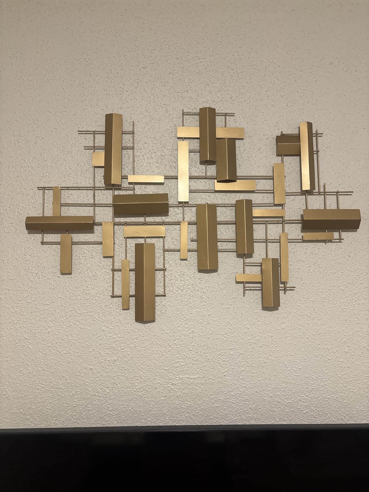 CosmoLiving by Cosmopolitan Metal Geometric Home Wall Decor 3D Stripe Wall Sculpture, Wall Art 36in x 1in x 23in, Gold customer photo 2