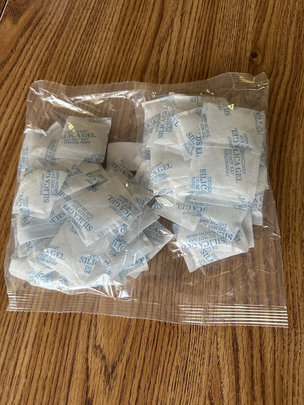 Silica Gel Desiccant Packets Non Toxic Drying Agent Moisture Absorber Packs for Storage (3 Gram - 100 Packets) customer photo 1