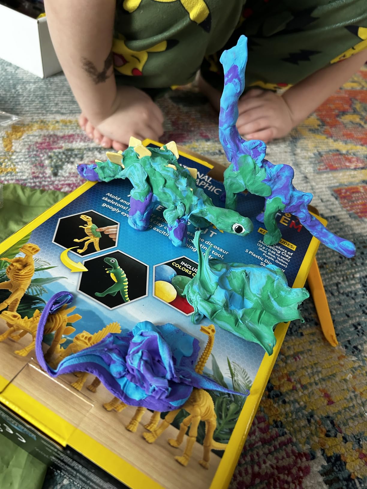 National Geographic Clay Dinosaur Arts & Crafts Kit - Air Dry Clay Arts and Crafts Kit for Kids with 5 Colors, 5 Dino Skeletons & Googly Eyes, Dinosaur Activity for Girls and Boys Ages 4 5 6 7 8 9 10 customer photo 1