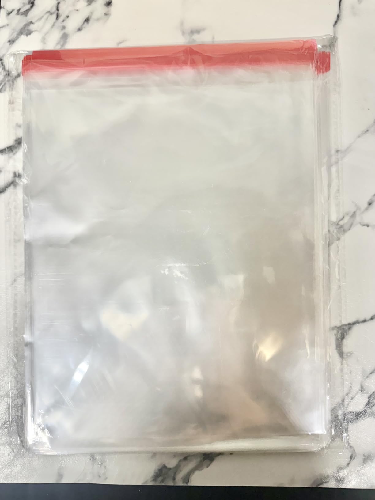 Delatanus 8-1/4 x 10-1/4 Inch Clear Cellophane Cello Bags - Fits 8x10 Inch Prints Photos Cards Candy Treats Cookie Clear Plastic Sleeves - 100 Pcs customer photo 1