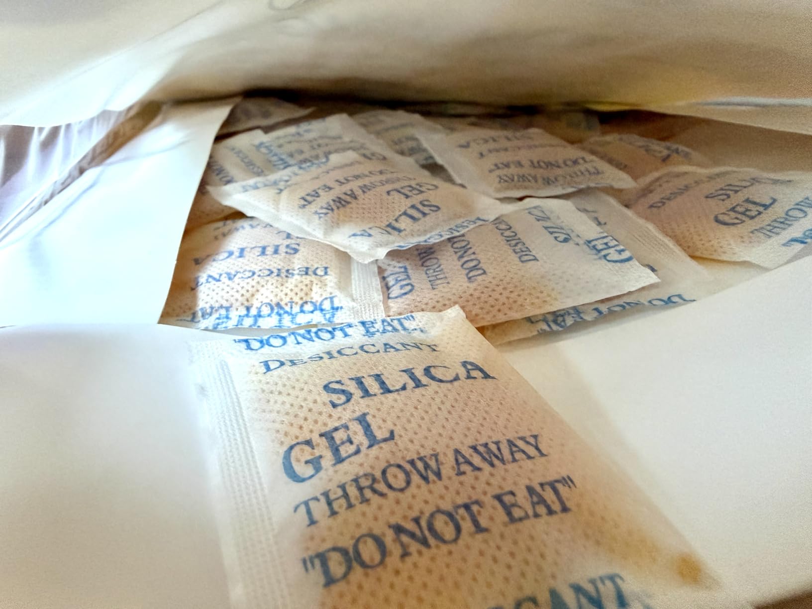 50 Pack 5 Gram Desiccant Packs for Storage, Premium Silica Gel Packets (Rechargeable & Color Indicating), Safe Food Grade customer photo 1