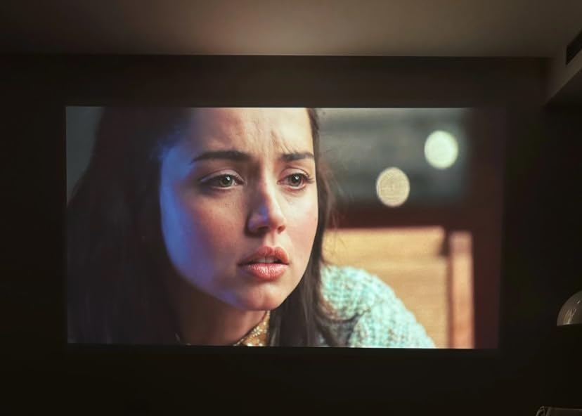 Smart Projector [Built-in Apps/4K Support/2026 Upgraded] with WiFi and Bluetooth, Native 1080P Outdoor Movie Projector, Auto Focus, Dolby Audio, TOPTRO Mini Portable Proyector w/ YouTube/Prime Video customer photo 1