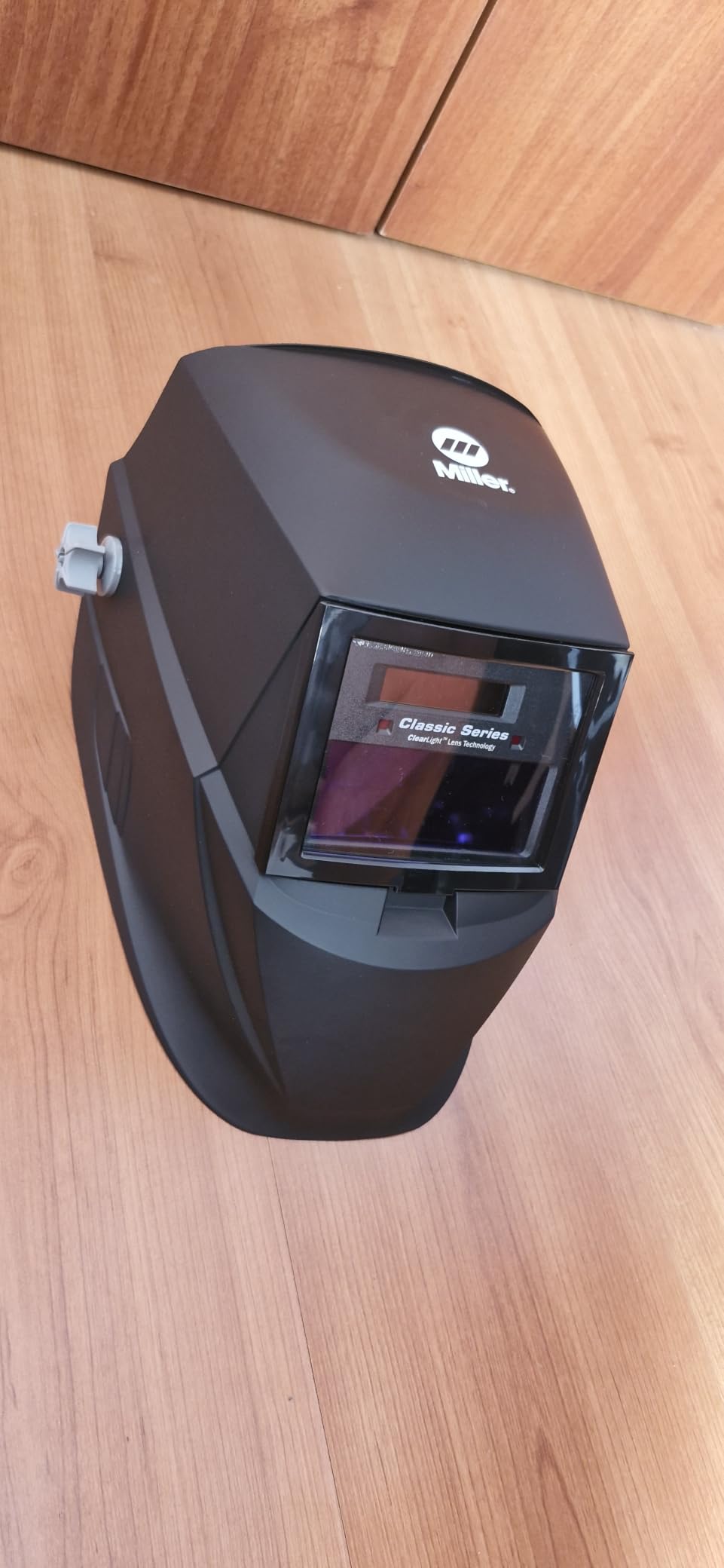 Miller Classic Series Welding Helmet, ClearLight, Shade 8-13, Black | For the value-minded welder; TIG/MIG; variable shade 8-13; HD optics; comfortable headgear customer photo 1
