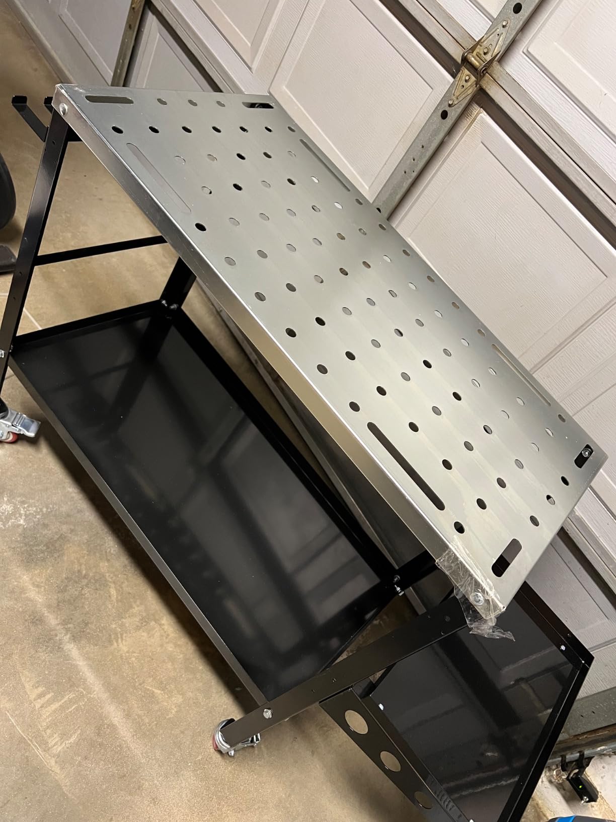 Goplus Rolling Welding Table, 1200 LBS Welding Workbench Table Top w/Lockable Wheels, Tool Rack & Tray, 144 5/8