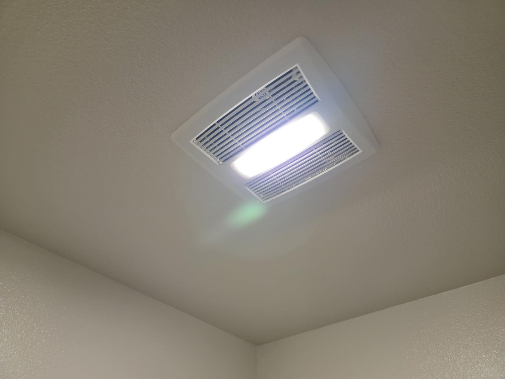 Broan-NuTone Bathroom Exhaust Fan with LED Light and Roomside Installation, Energy Star Certified, 110 CFM, Very Quiet 1.0 Sones White, AE110L customer photo 1