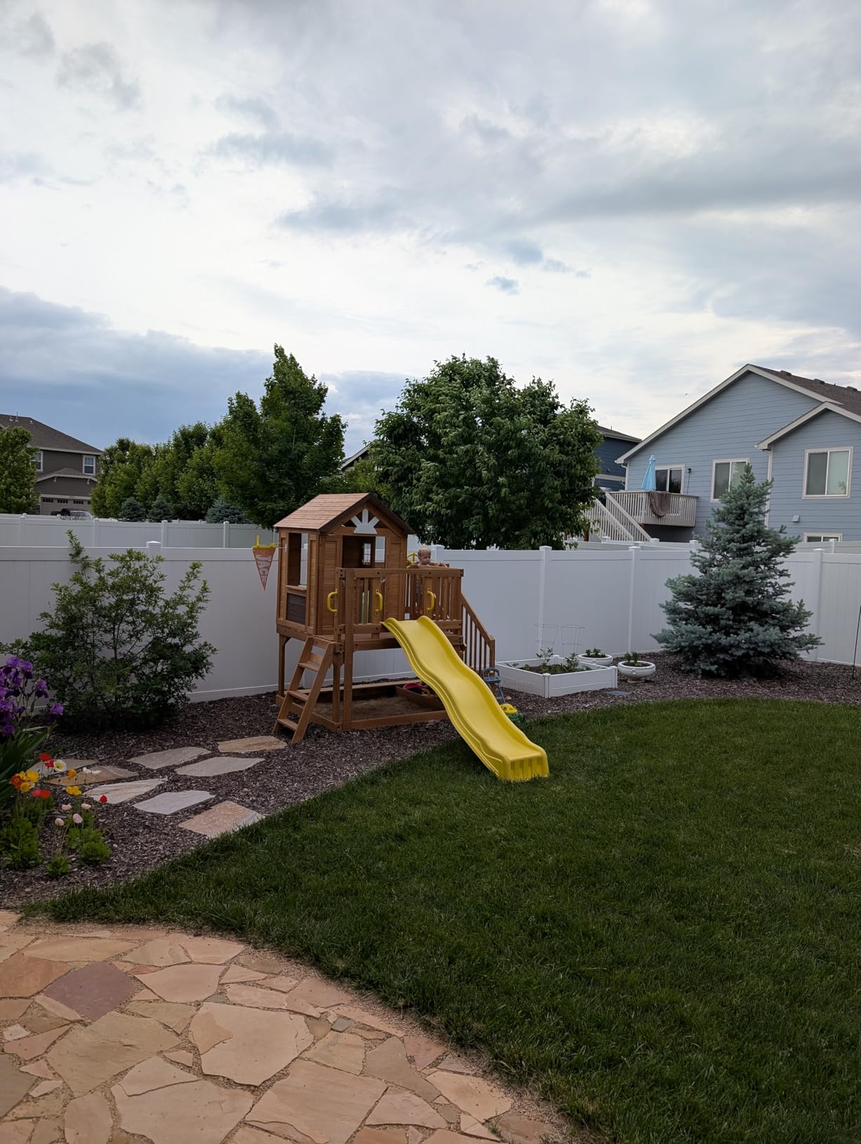 Backyard Discovery Scenic Heights Elevated Cedar Wooden Kids Playhouse with Play Kitchen, Wrap-Around Deck, Saloon-Style Doors, Ladder, Stairs, and Growth Chart customer photo 2