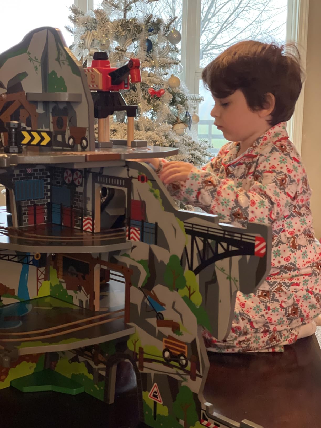 Hape Wooden Railway Mighty Mountain Mine Railway Playset | 4-Level Railway Train Track Playset with Crane and Magnetic Train Cars for Kids customer photo 1