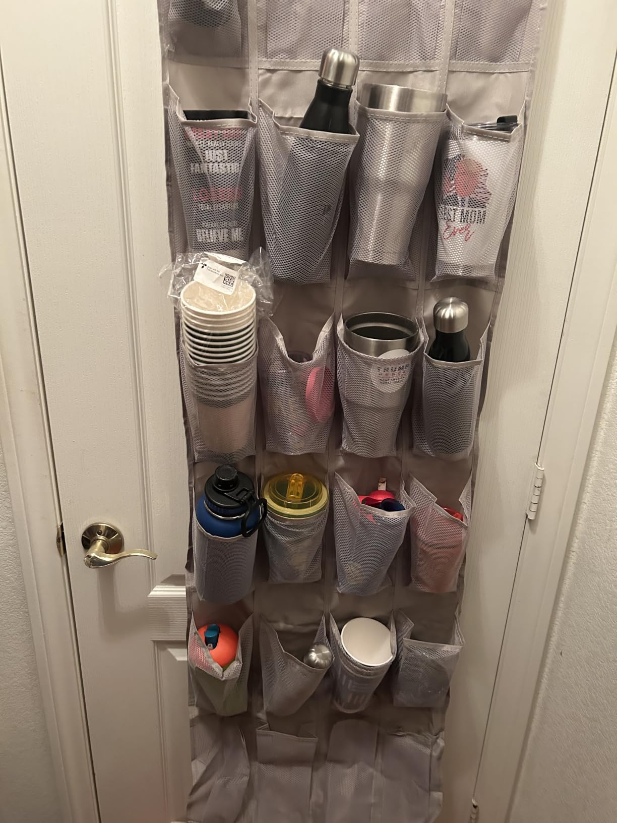 Amazon Basics 24 Medium Mesh Pocket Over-the-Door Hanging Shoe Organizer, Space Saving Shoe Storage, Light Grey | Over-the-Door customer photo 2