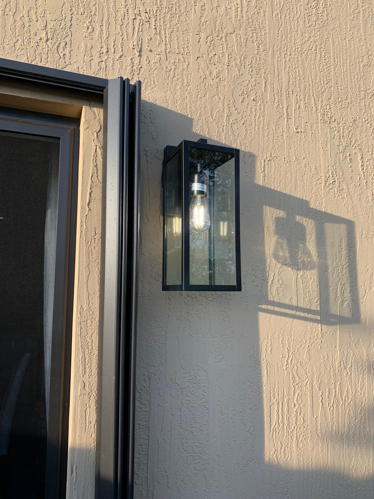 Globe Electric 44176 1-Light Outdoor/Indoor Wall Sconce, Matte Black Finish, Clear Glass Shade, Weather-Resistant Modern Exterior Light customer photo 2