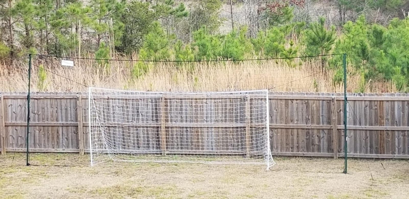 Open Goaaal Soccer Goal, Rebounder and Backstop Net | All-in-one backyard system; continuous shooting practice and missed-shot protection customer photo 1
