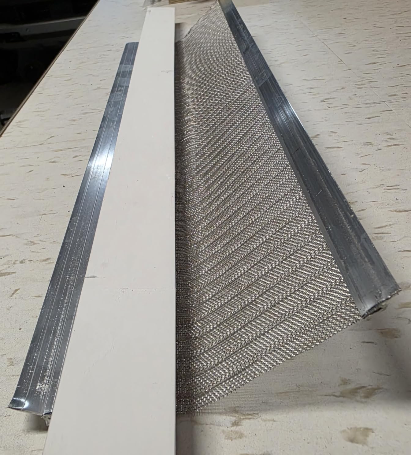 RAPTOR GUTTER GUARD - 48 FT. (Nominal) Contractor Grade Stainless Steel Micro-Mesh Gutter Guard Kit with Screws Included. Fits 5 in. Gutters and Smaller. DIY-Friendly. (5.625 in. x 47.625 in.) customer photo 2