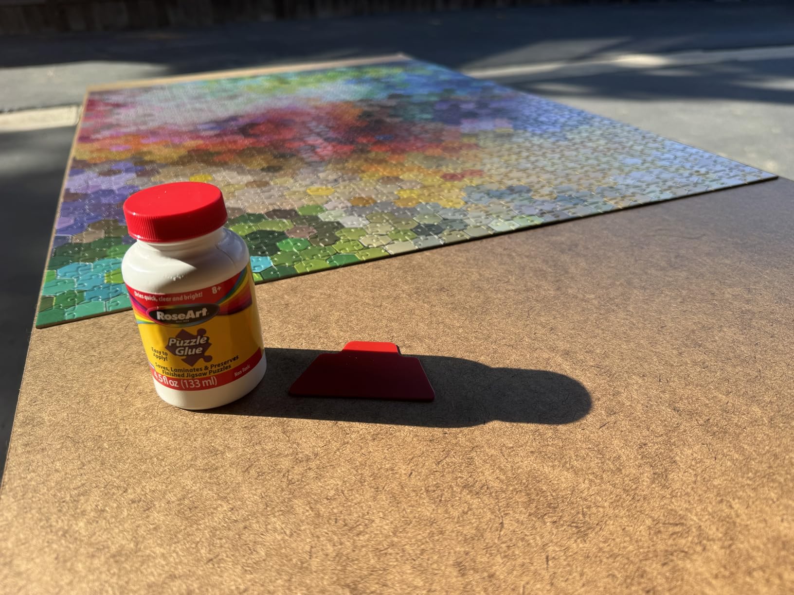 RoseArt Jigsaw Puzzle Glue with Applicator - Saves, Laminates and Preserves Finished Jigsaw Puzzles - Easy to Apply, Dries Quick, Clear & Bright customer photo 2