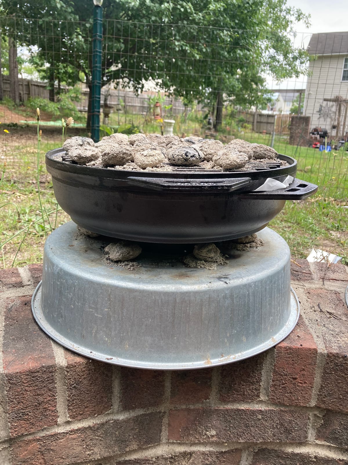 Lodge Cast Iron Cook-It-All Kit. Five-Piece Cast Iron Set includes a Reversible Grill/Griddle 14 Inch, 6.8 Quart Bottom/Wok, Two Heavy Duty Handles, and a Tips & Tricks Booklet. customer photo 2