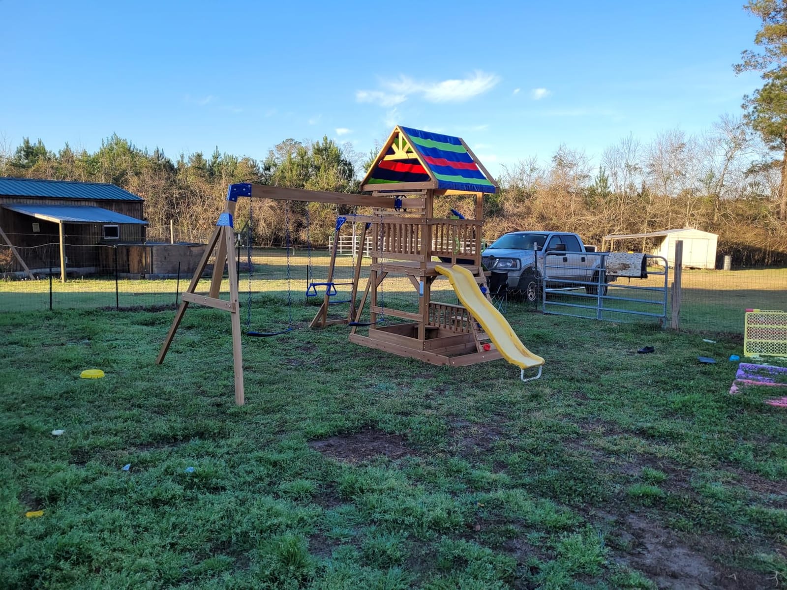 Backyard Discovery Belmont Cedar Wood Swing Set with Wave Slide, Play Deck, Rock Wall Ladder, Snack Bar Window, Shaded Picnic Area, Bench, Belt Swings, Trapeze, Sandbox Area, Canopy, Outdoor Playset customer photo 1