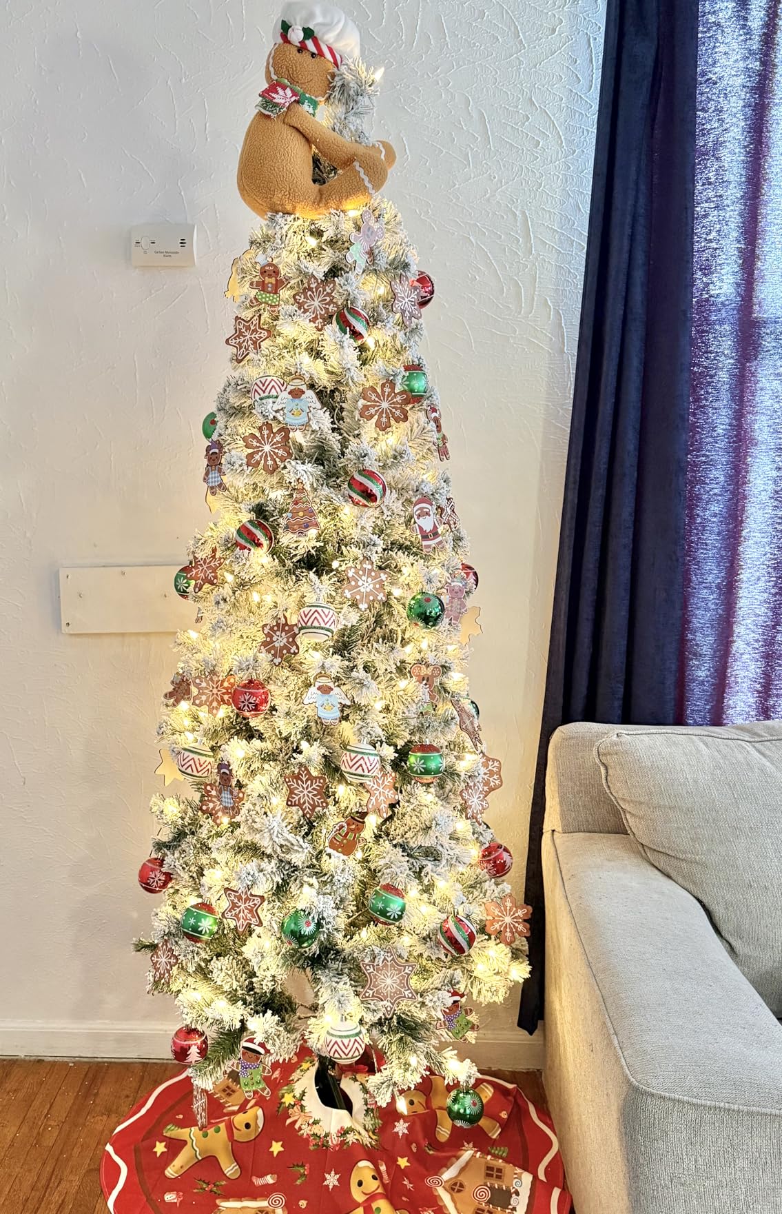 National Tree Company 6 ft Pre-Lit Flocked Acacia Slim Artificial Christmas Tree, 250 Clear Lights, 512 Tips, Includes Stand, Green customer photo 2