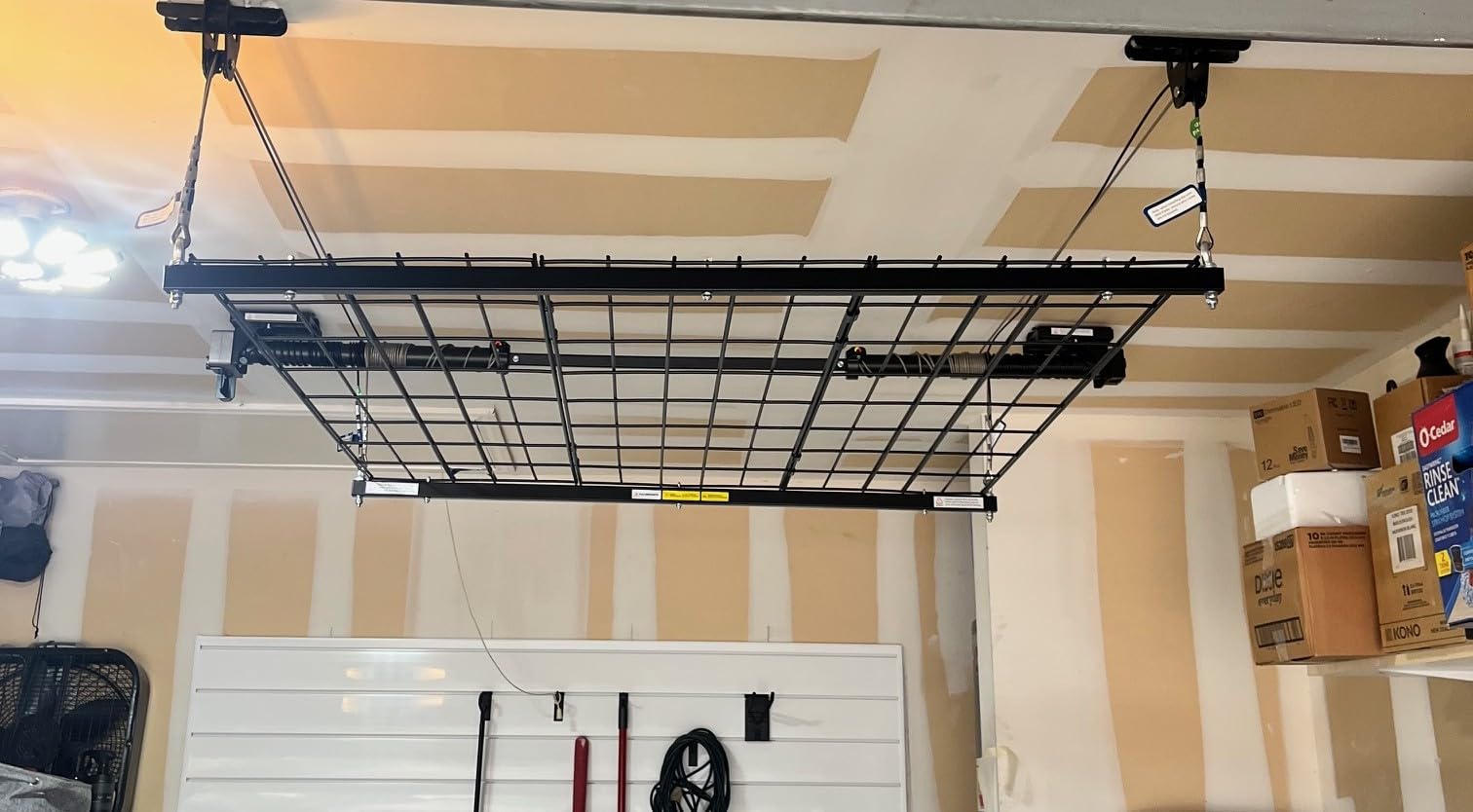 FLEXIMOUNTS GL1 Overhead Garage Lifting Storage Rack, 4x4 Ft Heavy-Duty Metal Garage Ceiling Rack, Adjustable Organization System With 71''L Axle, 350lbs Weight, Black customer photo 1