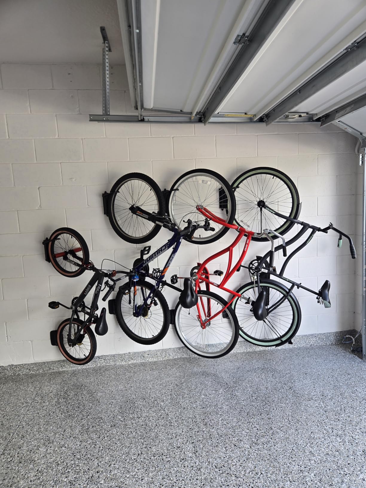 monTEK Swivel Bike Wall Mount, Bike Hangers for Garage, 4 Pack | Heavy-duty vertical wall bike storage rack swivels 150° to save space; holds 66 lb each and fits tires up to 3.54 in wide customer photo 2