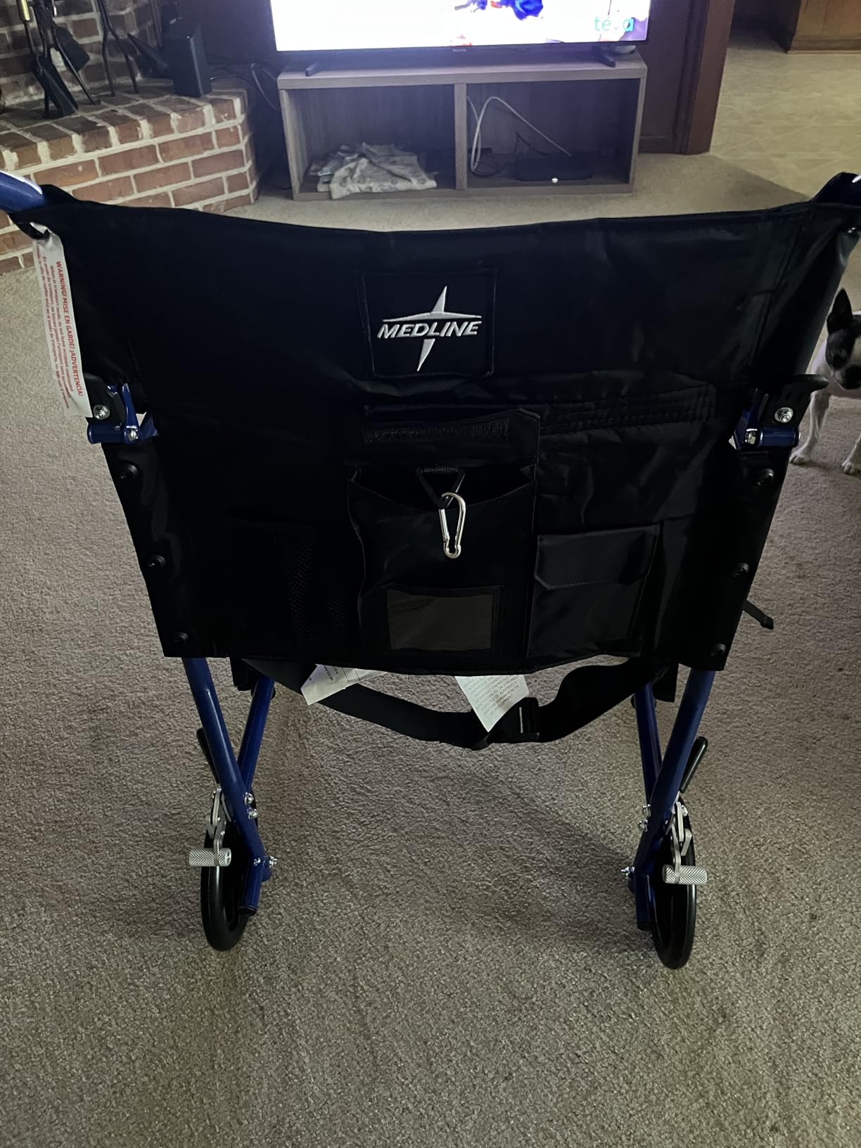 Medline Ultra Lightweight Transport Wheelchair for Adults, Foldable, 19-Inch Seat Width, Red Frame, Black Upholstery customer photo 2