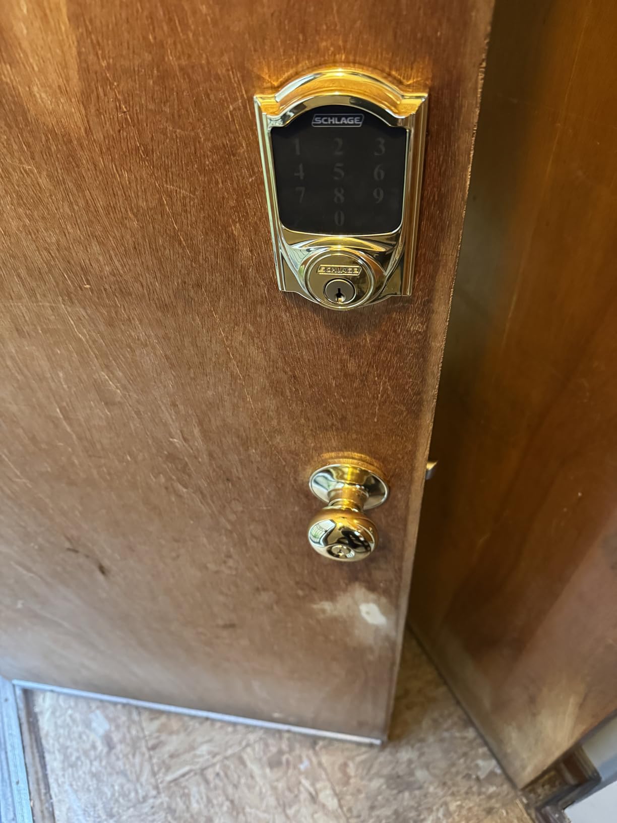 SCHLAGE Lower Half Entry Handleset, Georgian Knob, Aged Bronze | Exterior front door handleset grip with interior knob, No deadbolt, Pairs with smart locks, Certified durability customer photo 1