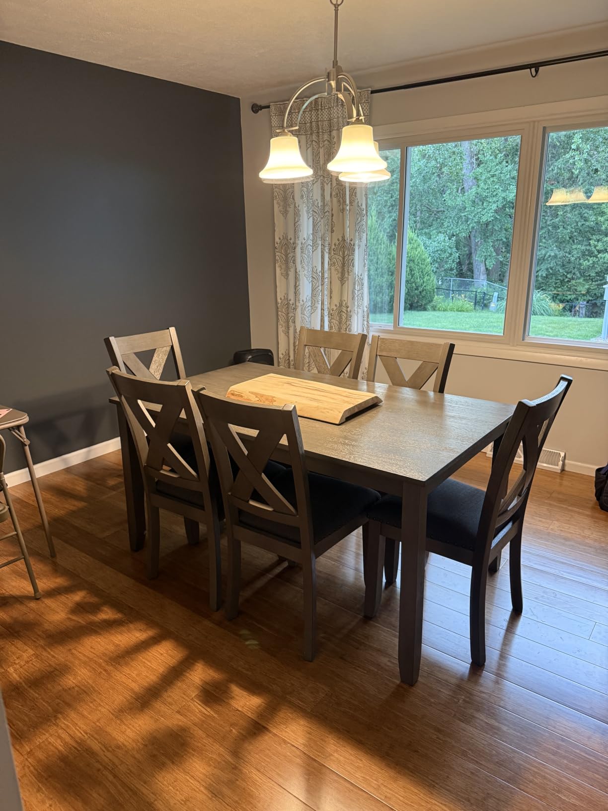 Signature Design by Ashley Rokane 7-Piece Dining Table Set for 6, Brown | Rustic rough-sawn wood veneer table, 6 easy-clean cushioned polyester chairs, Ideal for casual family dining customer photo 2