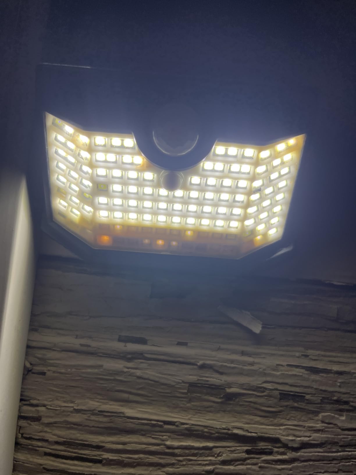 HMCITY Solar Lights Outdoor 120 LED with 3 Lighting Modes, Motion Sensor Wall Lights,IP65 Waterproof Solar Powered for Garden Patio Yard (Back Button 2Packs, Black Shell-Daylight White) customer photo 1