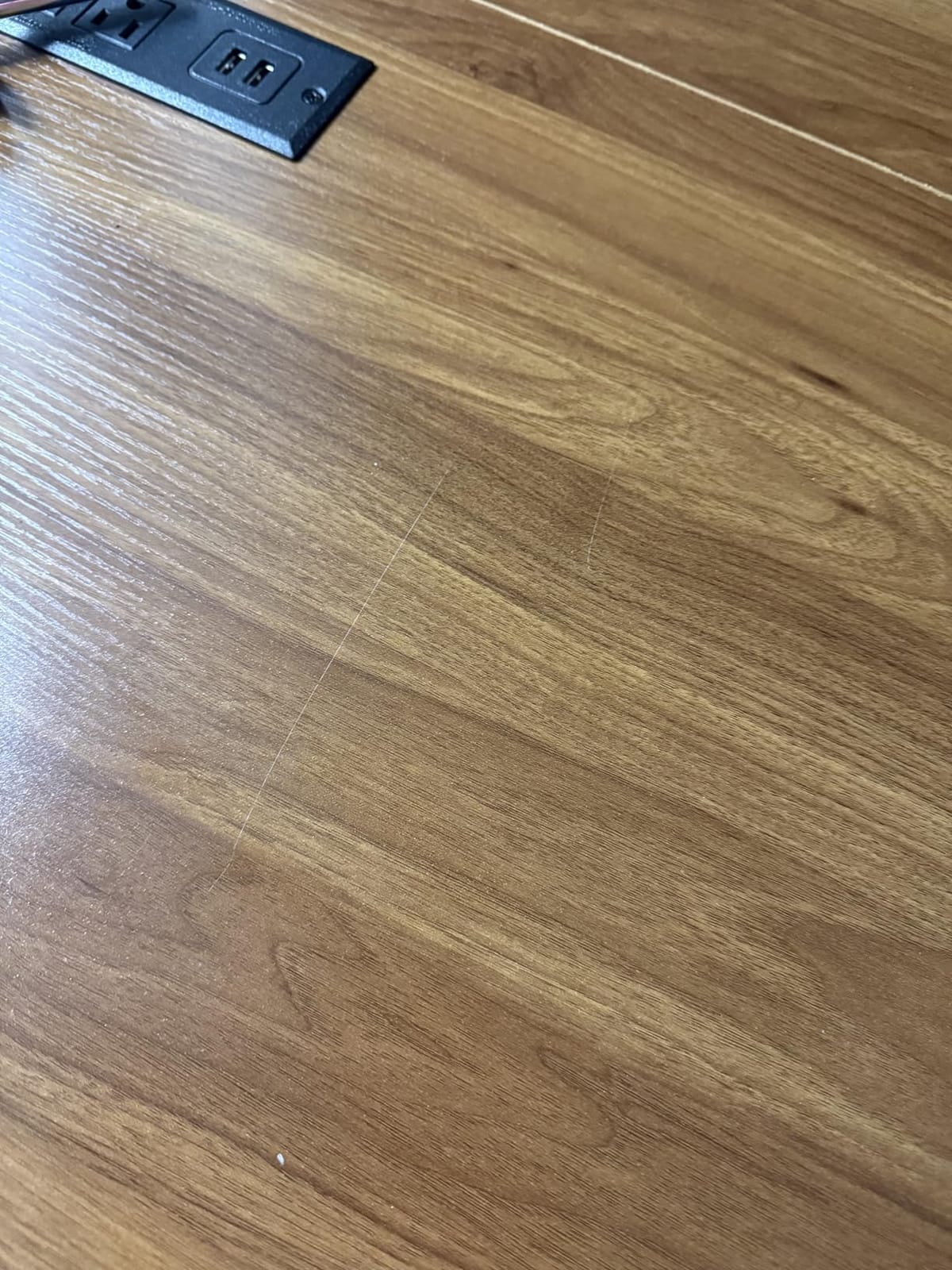 53.7