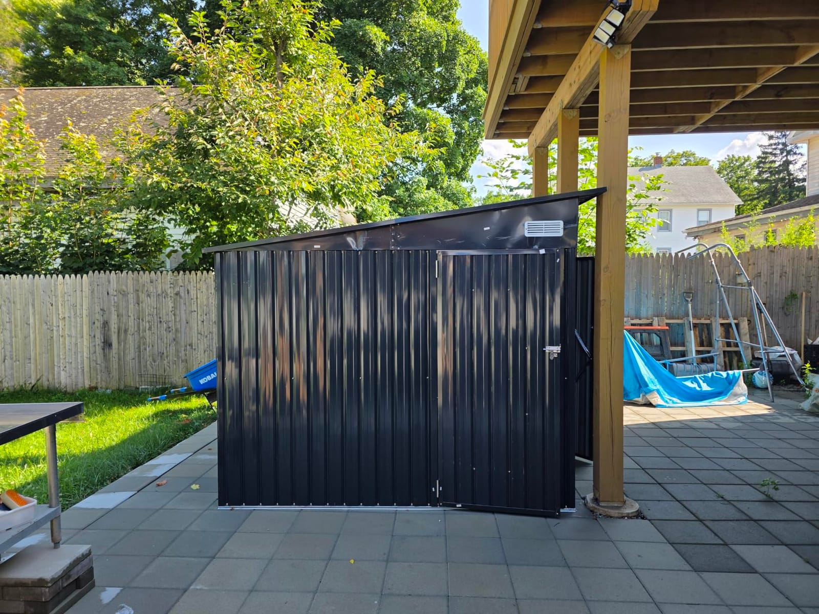 8'x12' Outdoor Lean to Storage Shed with Triple Doors Utility Galvanized Steel Sheds for Vertical Storage, Dual Lock Metal Shed with Sloped Roof for Mower,Bike,Garden Tools (Black) customer photo 1