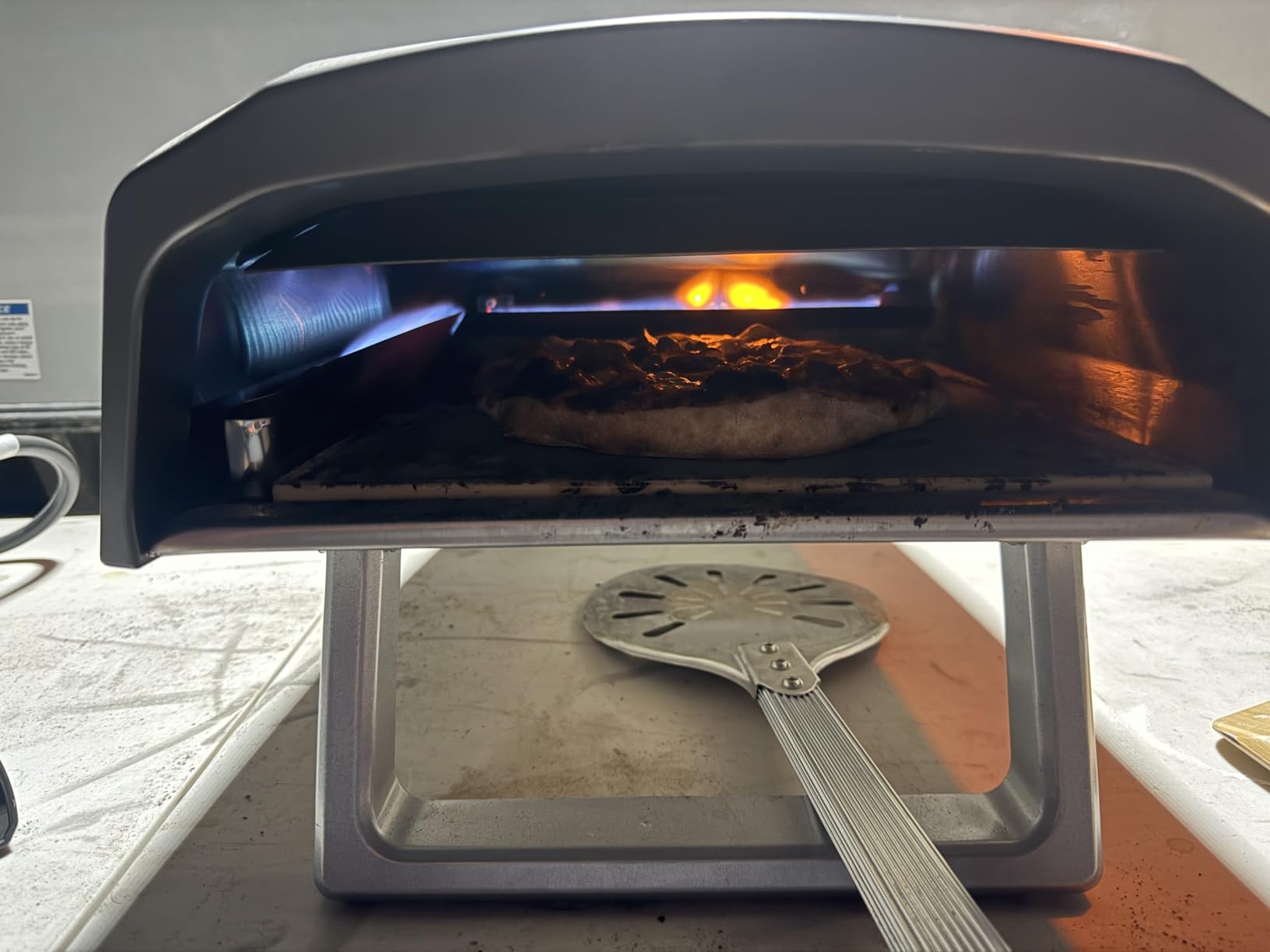 NutriChef Portable Outdoor Gas Pizza Oven - Unique Design, Easy Bake Oven with Pizza Stone, Foldable Feet, One-Touch Gas Ignition, Adjustable Heat Control, Stainless Steel, 932°F Max customer photo 2
