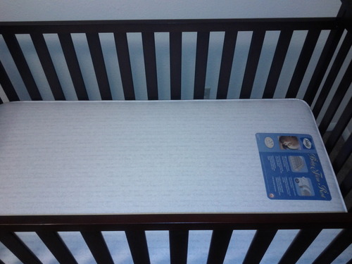 Sealy Baby Infant & Toddler Crib Mattress, Firm Rest 2 Stage, 204 Coils, Waterproof Breathable, Non Toxic, GREENGUARD GOLD Certified, Made in USA, 52x28 customer photo 1