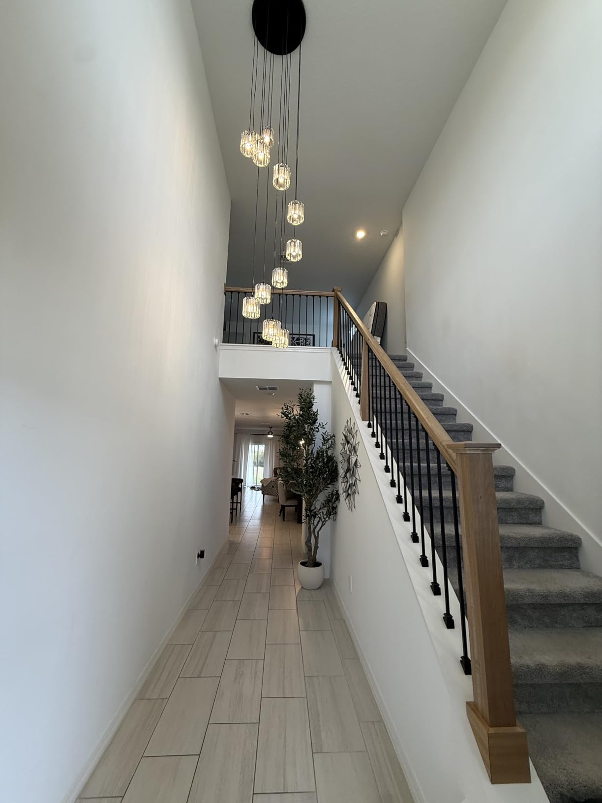 Long Chandeliers for High Ceilings,Modern Crystal Pendant Light,Raindrop Drop Lamp,Hanging Flush Mount Lighting Fixtures for Spiral Staircase,Foyer,Entryway,Living Room,Black (8 Lights) customer photo 1